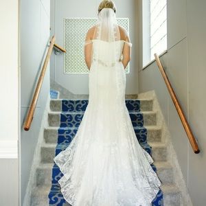 Ivory lace wedding gown